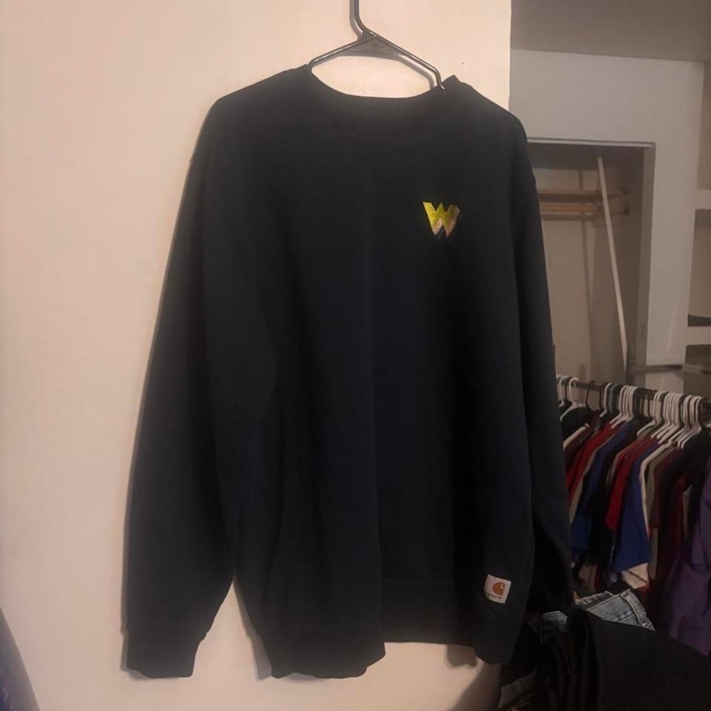 Black Carhartt crewneck sweatshirt with yellow logo